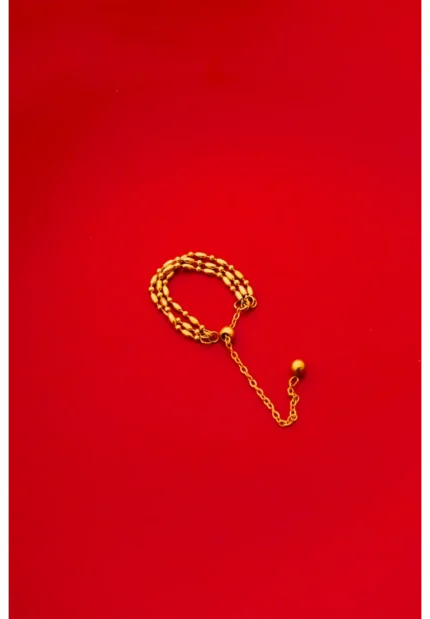 Sophisticated three-strand satellite chain ring featuring a bright gold-tone finish, oval bead accents, and a versatile slider chain fastening.