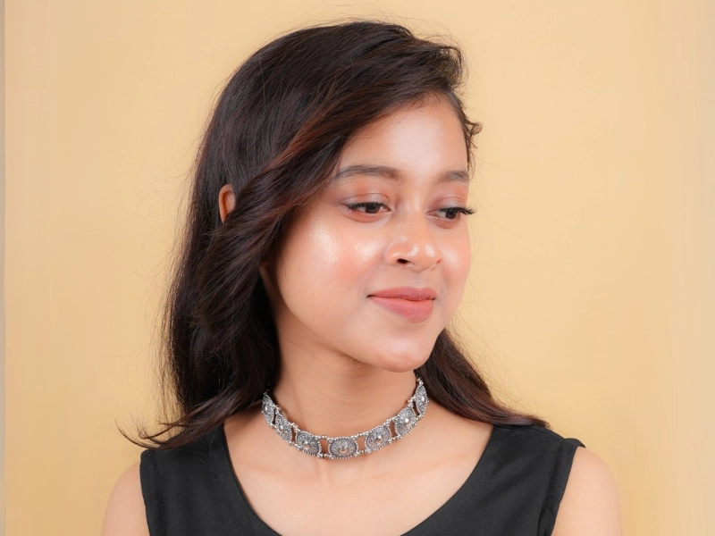 Elegant flatlay of oxidised jewelry including layered necklaces, jhumkas, bangles, and rings styled with ethnic and Western outfits – perfect for every occasion 5