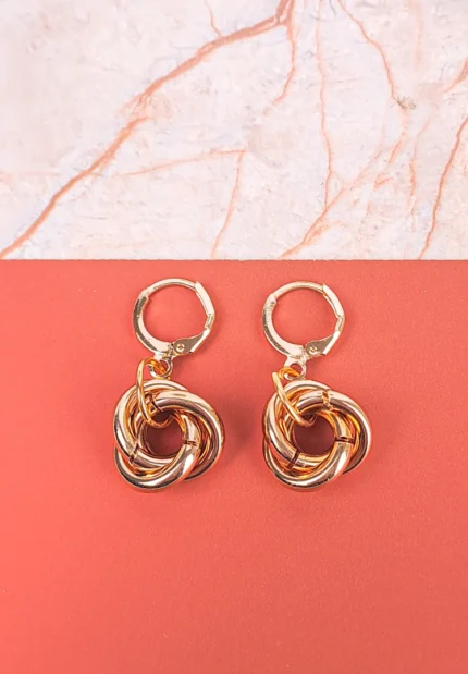  Drop earrings with interlocking metal knots and secure hoop clasp, on jewelry card.