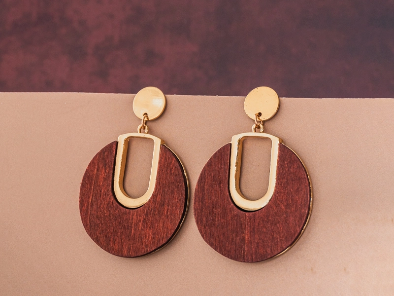 Styling earrings with playful dangles for casual fashion