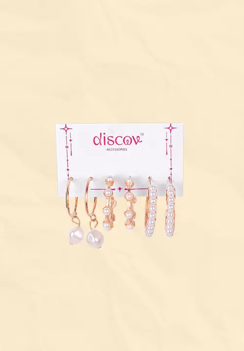 f (5) This large gold-toned earring set features a mix of studs and hoops for multi-piercing stacks. It includes delicate butterfly hoops, chunky chain-link hoops, spiral hoops, crystal studs, and pearl studs.