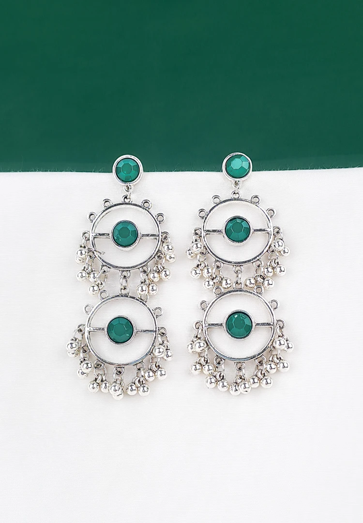 th (35) Silver geometric dangler earrings with emerald-green stones and bead drops.