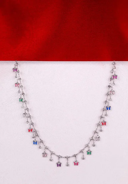 Delicate necklace with colorful butterfly charms on a fine chain, perfect for layering or everyday wear