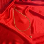 Stylish gold layered herringbone chain necklace with heart pendant and secure clasp