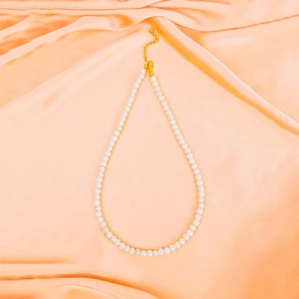 Classic single-strand pearl bead necklace with a gold adjustable clasp, showcasing a polished, elegant finish for a timeless look.