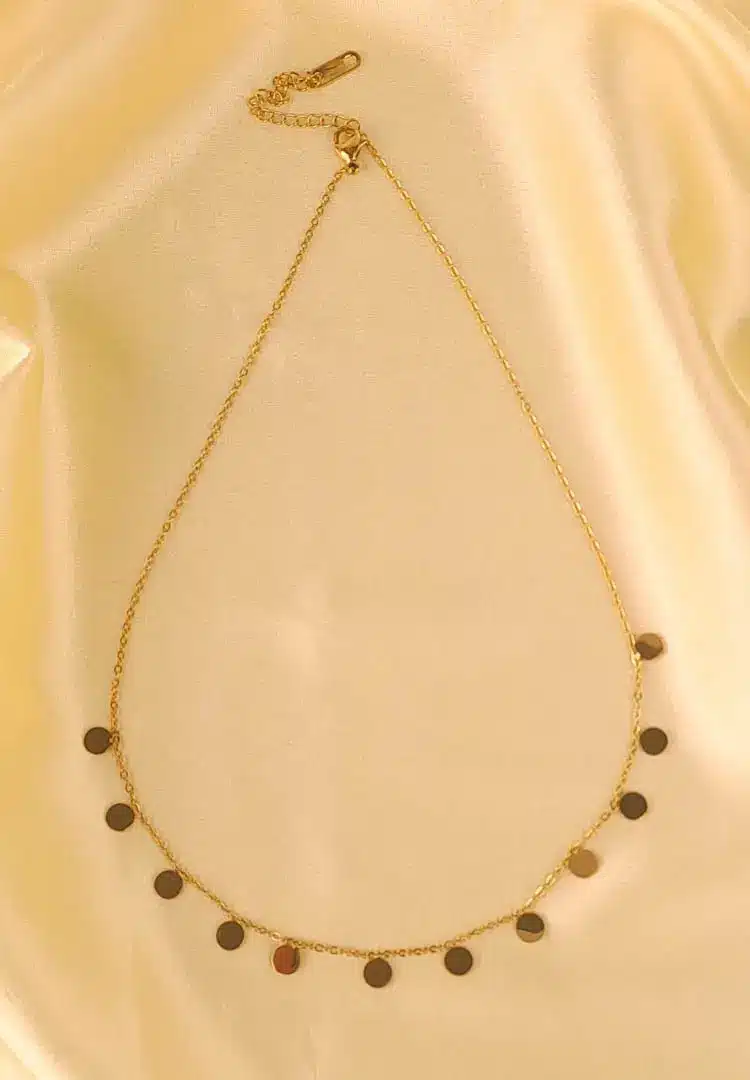 TH-670 Gold chain necklace with polished disc charms and adjustable lobster clasp.