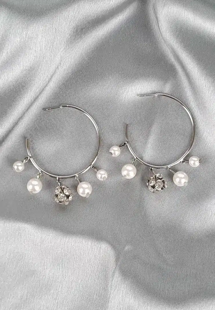 th - 2025-12-08T122701.152 Silver hoop earrings with dangling pearls and crystal charms, polished finish, and push-back closure for elegant style.