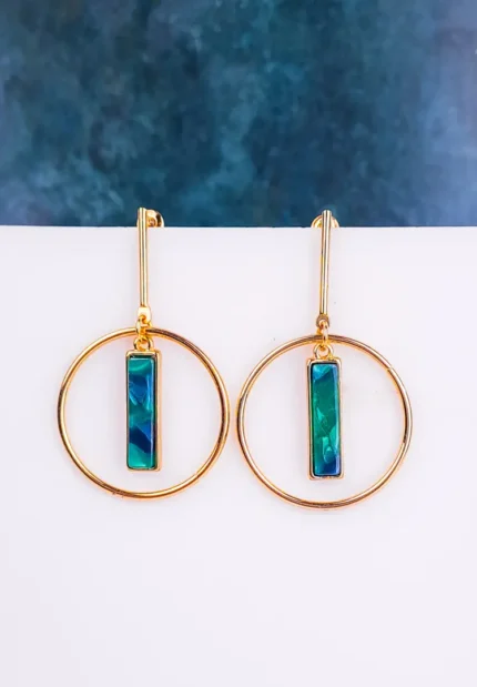  Geometric open circle earrings with resin accents and sleek finish, secured with post closure.