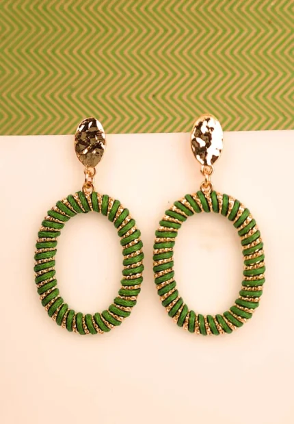 "Green and gold chunky spiral hoop earrings with a polished finish and push-back closure, offering a trendy statement style. "