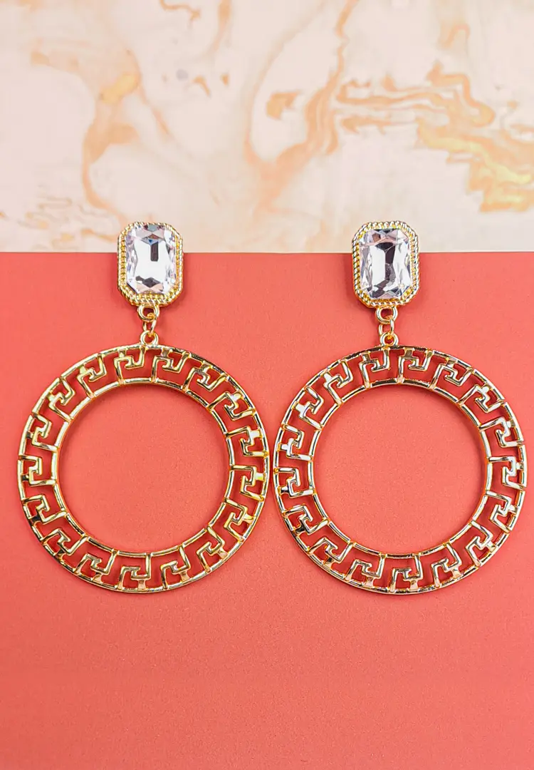 th - 2025-12-08T154858.201 Gold geometric hoop earrings with crystal studs, Greek key design, and push-back closure.