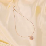 Rose Gold Circular Gem Spinning Necklace - Image 5