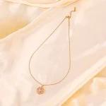 Rose Gold Circular Gem Spinning Necklace - Image 4