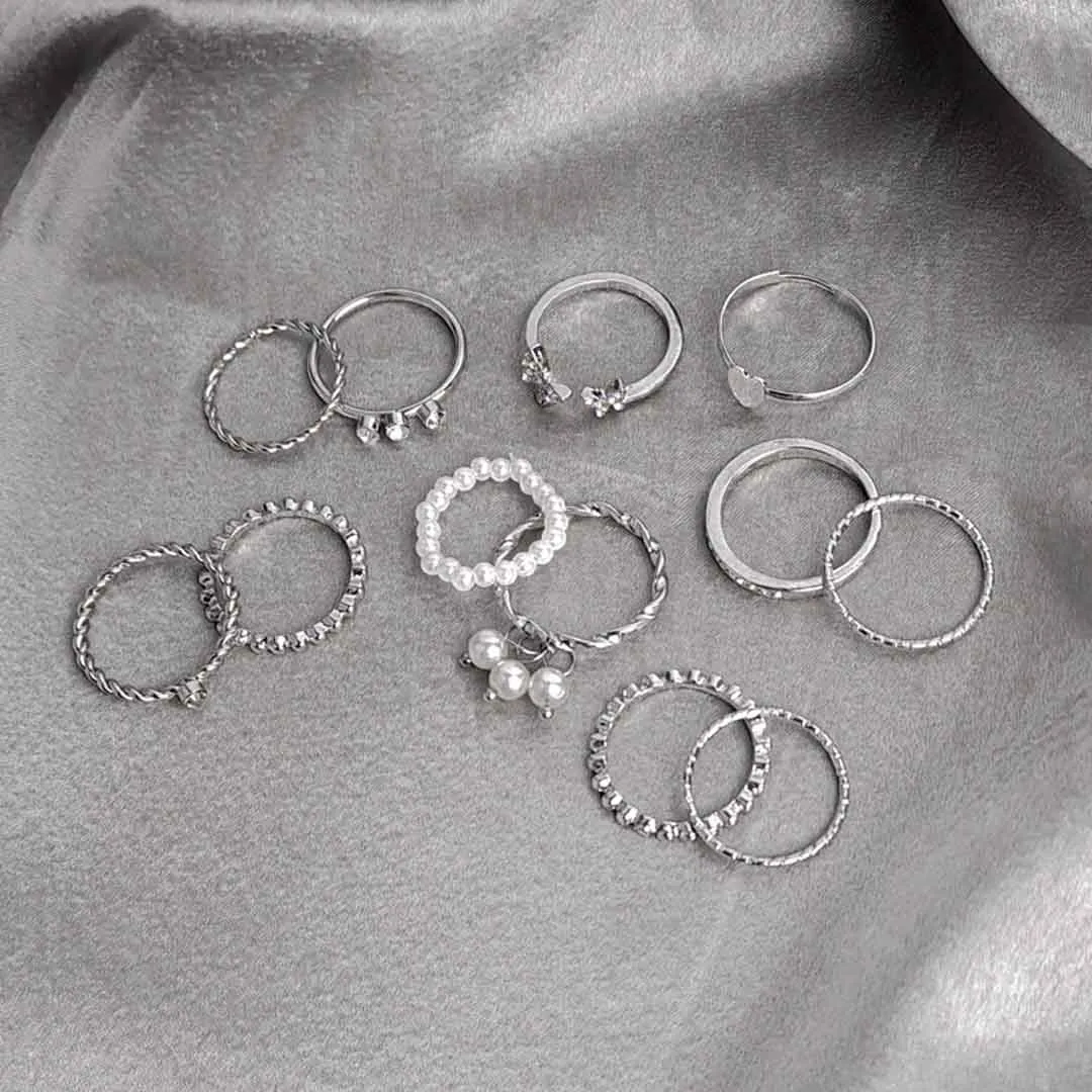 20251121_125155.webp Pack of 12 Eclectic Silver Pearl Sparkling Rings Combo - Image 1