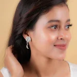 Intricate Floral Crescent Stud Earrings - Image 3