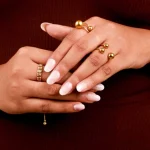 Pack of 2 Golden Orbit Sphere Open Rings