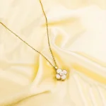 Golden Pearl Floral Spinning Necklace - Image 4