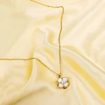 Golden Pearl Floral Spinning Necklace - Image 2