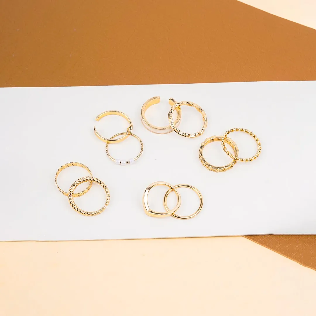 DSC00815.webp Pack of 10 Golden And Pearly White Chain Rings Combo - Image 1